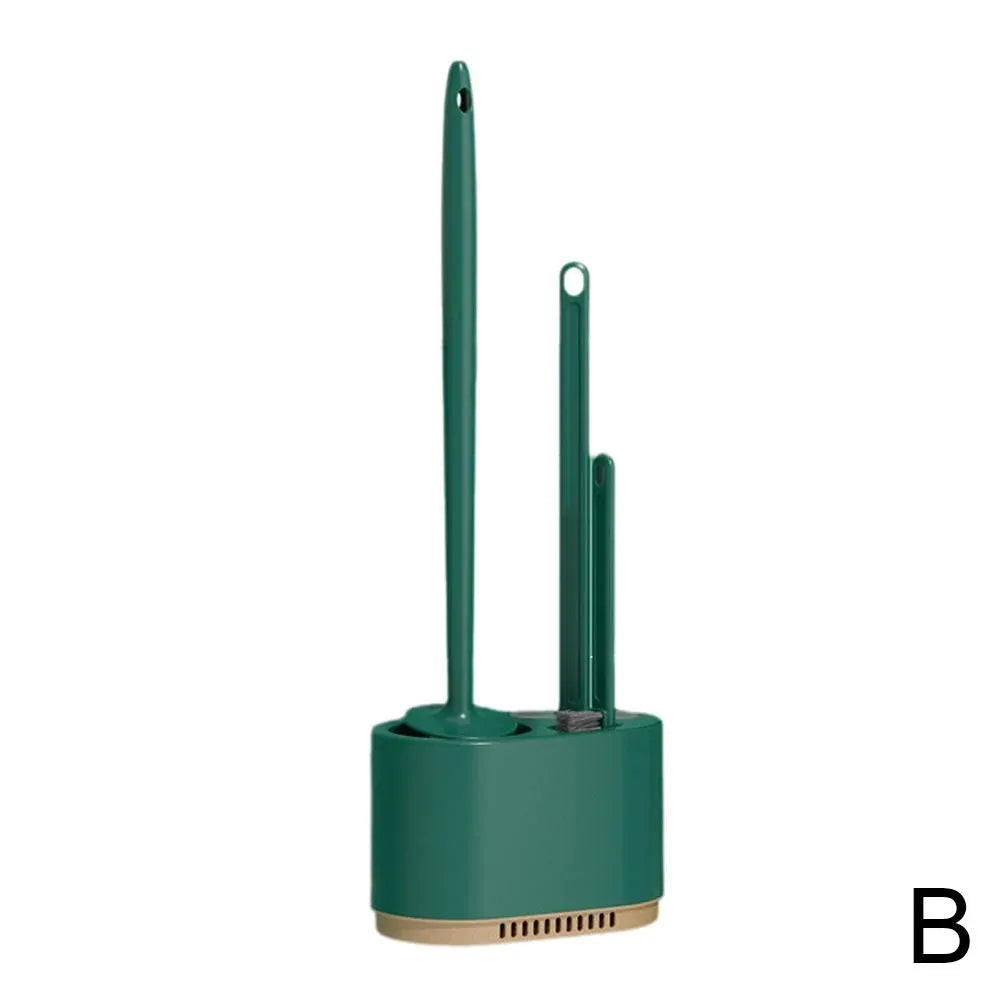 Wall mounted dark green toilet brush and plunger set beside a toilet, floor kept clear