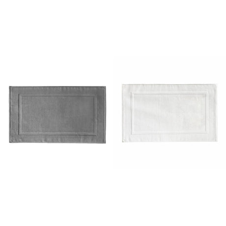 White cotton bath mat, 51 x 76 cm, flat woven floor towel style, laid on a bathroom floor