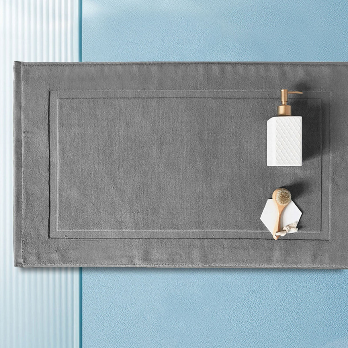 Close up of the thickened jacquard cotton weave on the white bath mat