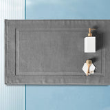 Close up of the thickened jacquard cotton weave on the white bath mat