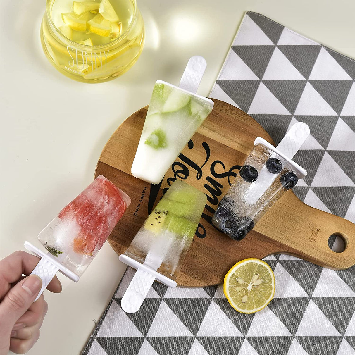 Green silicone six cavity ice pop mould with reusable sticks