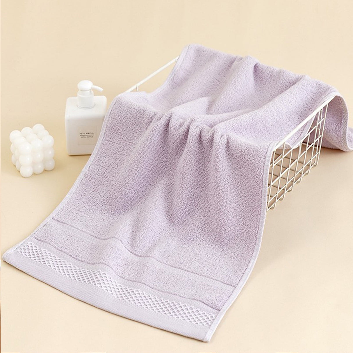 Cotton towel rolled up to show its lightweight, compact size