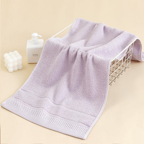 Cotton towel rolled up to show its lightweight, compact size