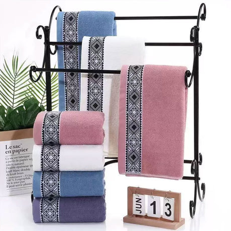 Soft cotton bath towel, 73 x 34 cm, folded and shown flat