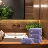 Cotton towel hanging over a bathroom rail