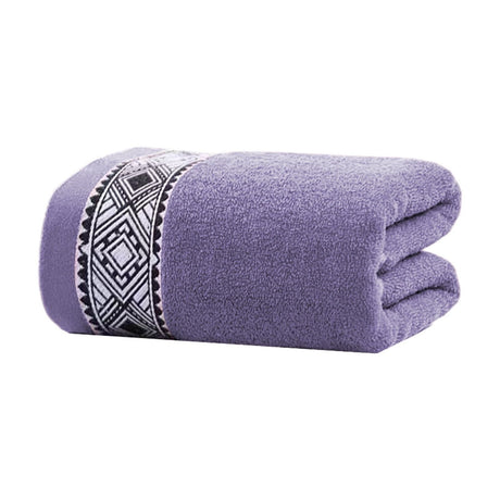 Cotton towel styled in a bathroom setting beside a basin