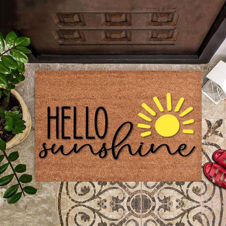 Floral entrance door mat with blue blooms and green foliage on brown
