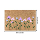 Floral entrance door mat with blue blooms and green foliage on brown