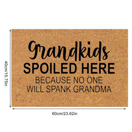 Floral print door mat with blue flowers on a brown ground