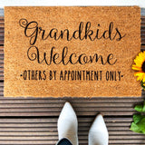 Floral print door mat with blue flowers on a brown ground