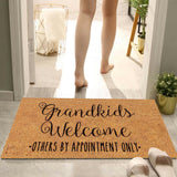 Floral print door mat with blue flowers on a brown ground