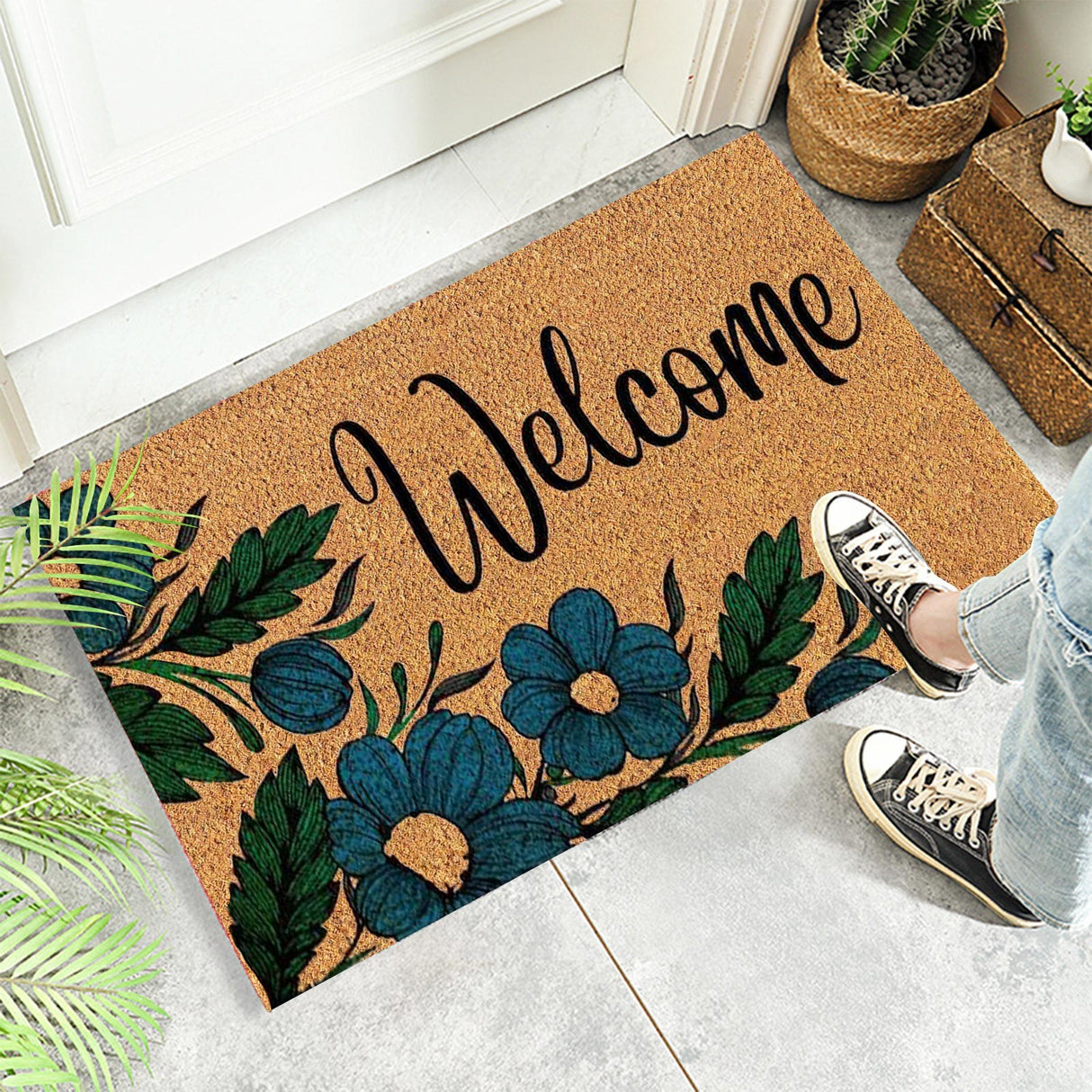 Floral print door mat with blue flowers on a brown ground