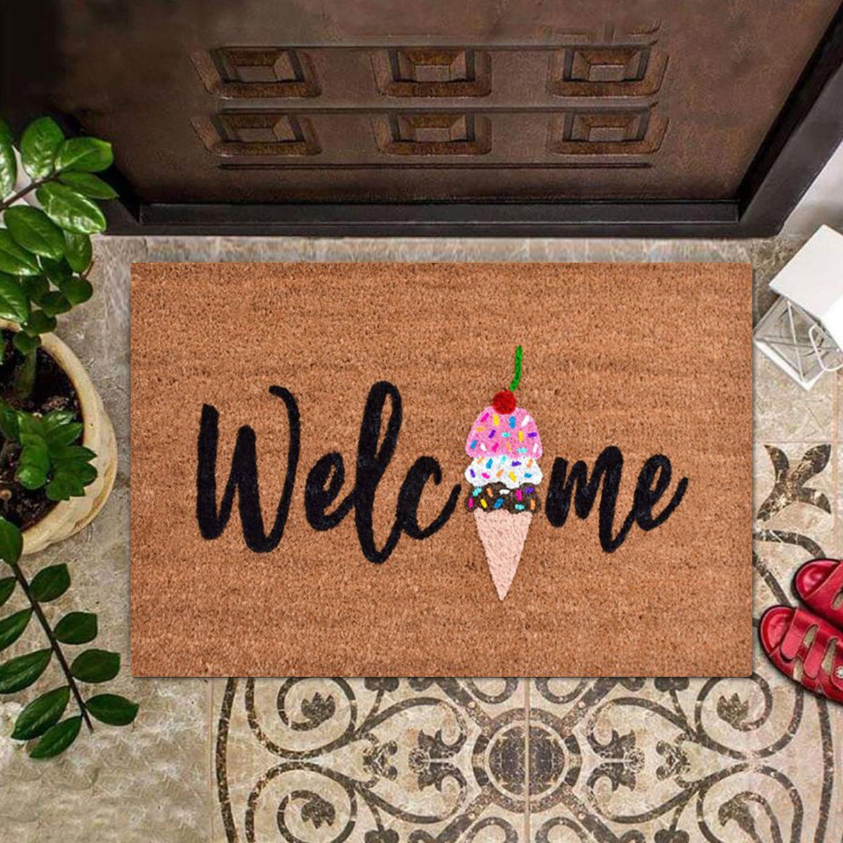 Floral print door mat with blue flowers on a brown ground