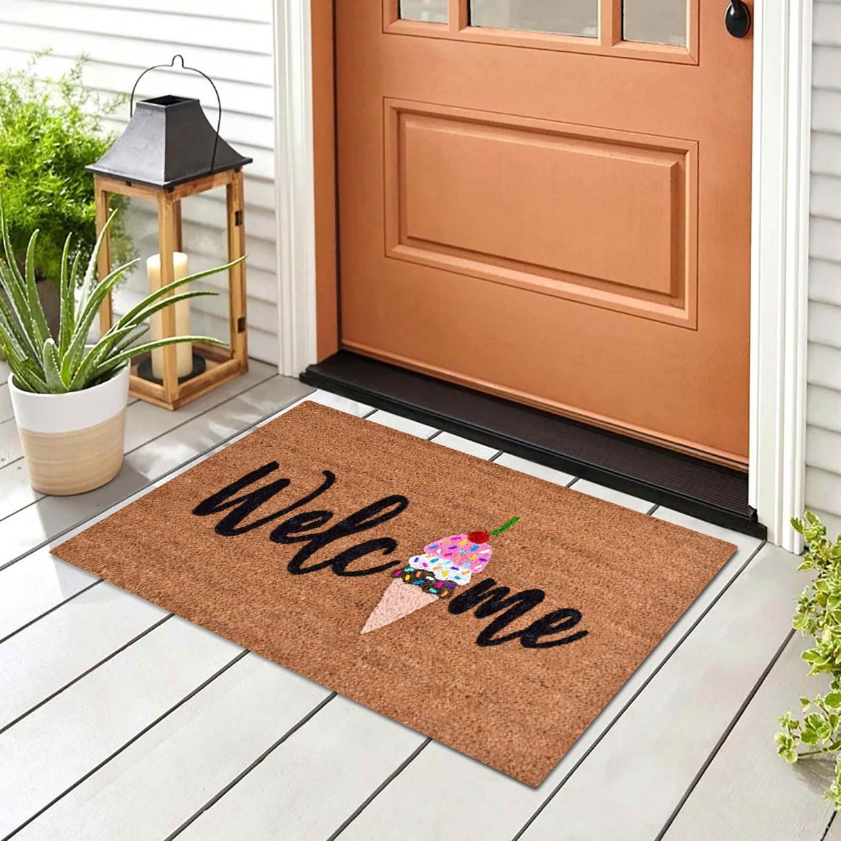 Floral print door mat with blue flowers on a brown ground