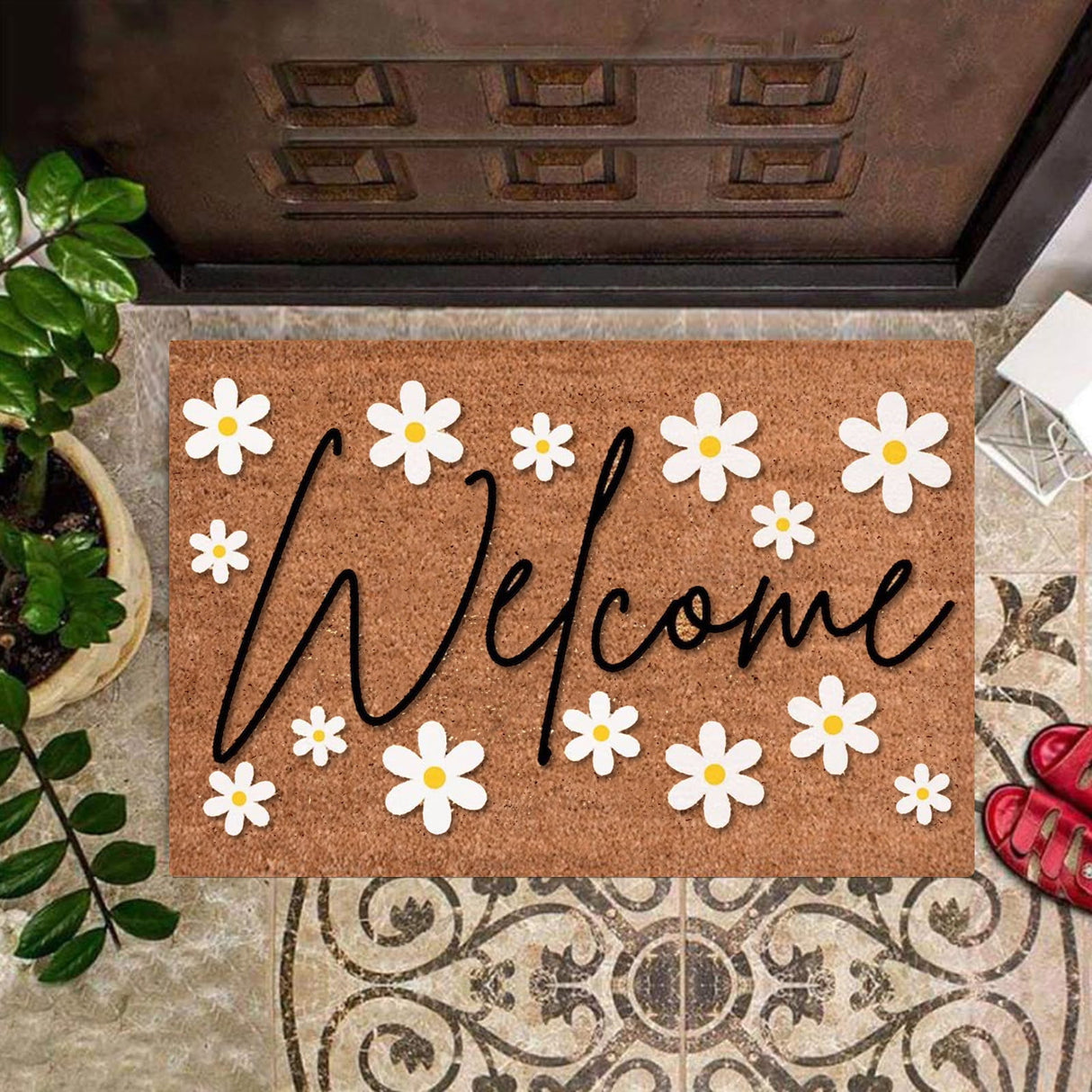 Floral print door mat with blue flowers on a brown ground