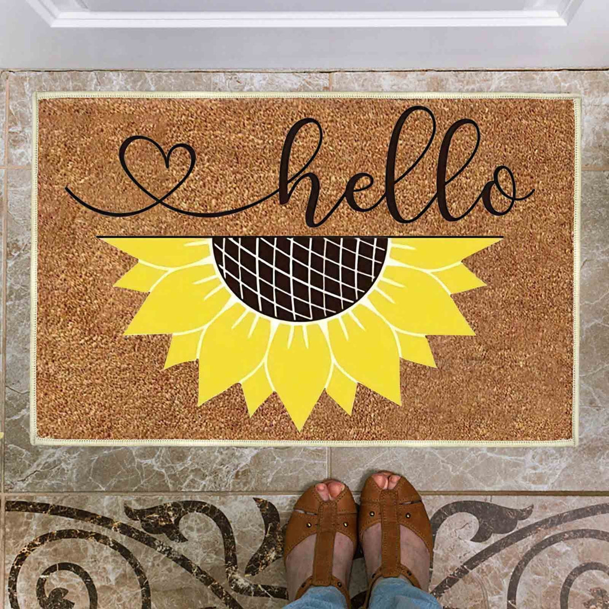 Floral print door mat with blue flowers on a brown ground