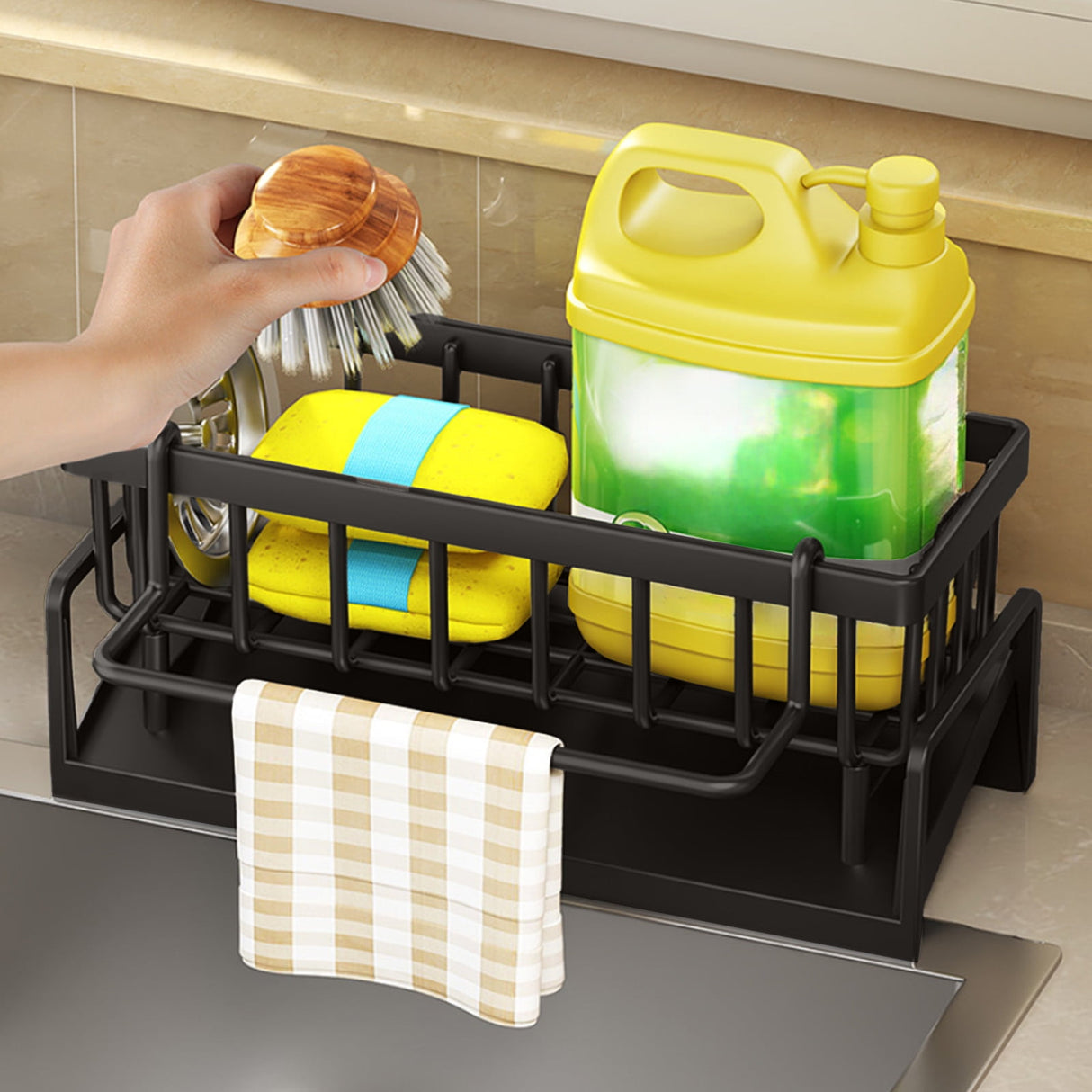 Detachable tray removed from the black sink caddy organiser for cleaning