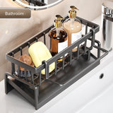 Sink caddy organiser used on a bathroom basin holding soap and a brush