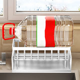 Detachable tray removed from the white sink caddy organiser for cleaning