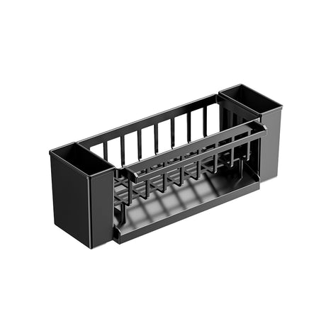 Black sink caddy holding sponges, brush and soap beside a sink