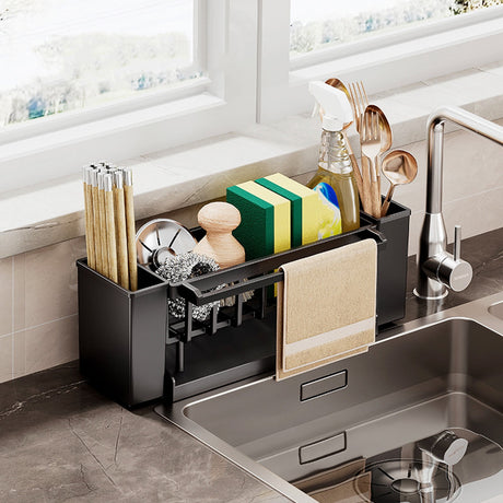 Detachable tray removed from the black sink caddy for cleaning