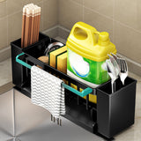 Black sink caddy organiser shown on a kitchen benchtop