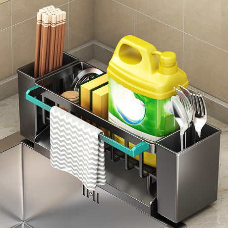 Dishcloth hanging from the towel rod of the grey sink caddy