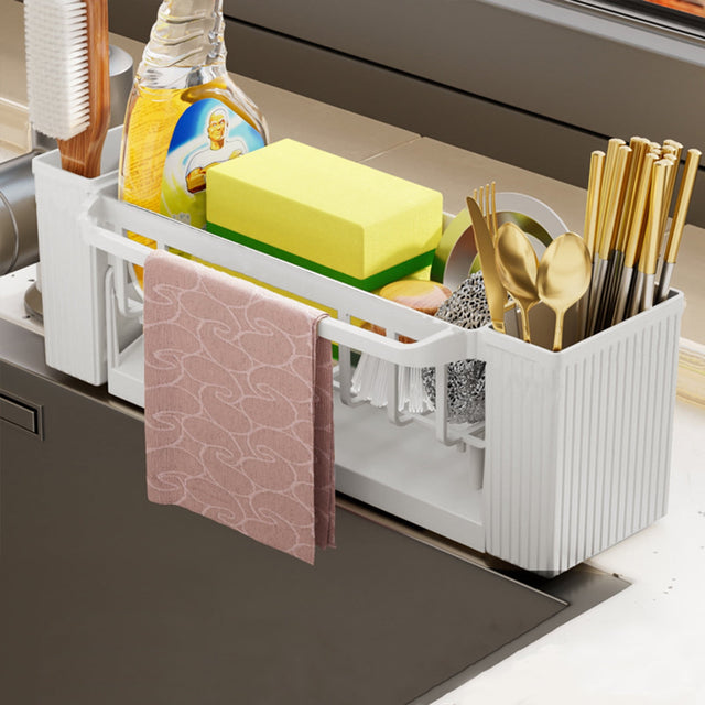 Beige kitchen sink sponge rack with draining tray and dishcloth rail