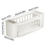 Inclined drainage tray of the beige sink rack draining water away