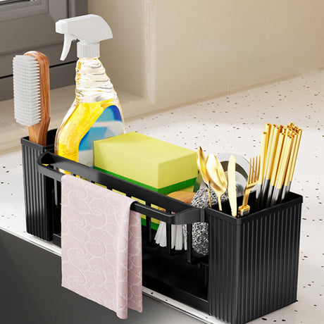 Detachable tray removed from the black sink caddy for cleaning
