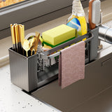 Grey sink caddy organiser with draining tray and hanging towel rod