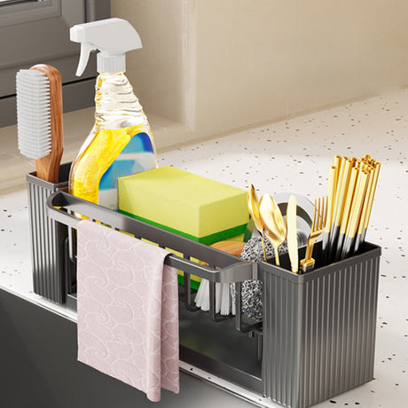 Detachable tray removed from the grey sink caddy for cleaning