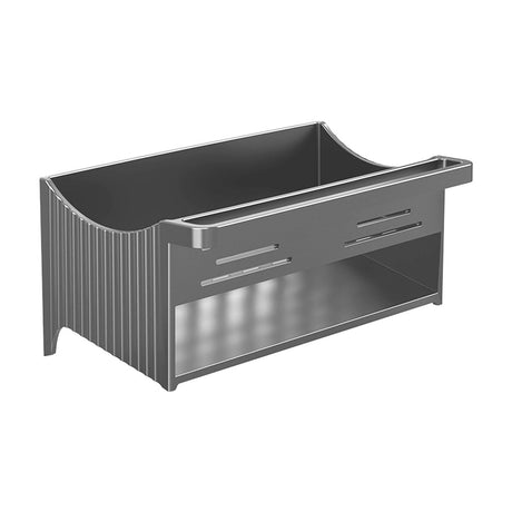 Grey sink caddy holding sponges, brush and soap beside a sink