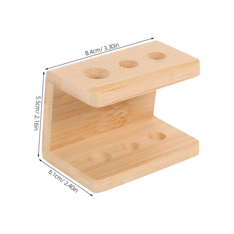 Top view of the three holes in the bamboo toothbrush stand