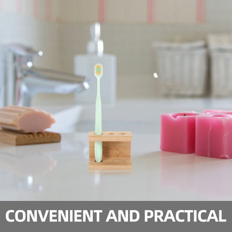 Bamboo toothbrush holder holding toothbrushes and a razor
