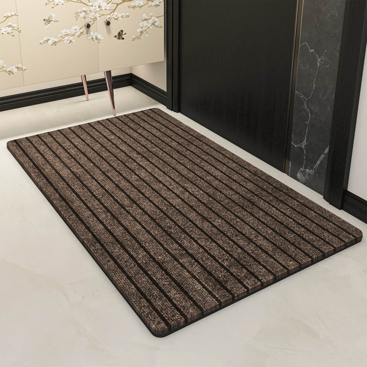Coffee coloured absorbent door mat at a home entryway