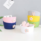 White grey woven storage basket side view