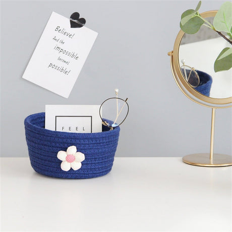 Small woven shelf toy basket in white and navy