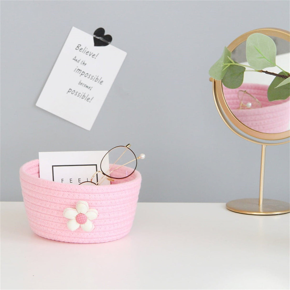 Small woven shelf toy basket in white and pink