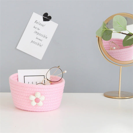 Small woven shelf toy basket in white and pink