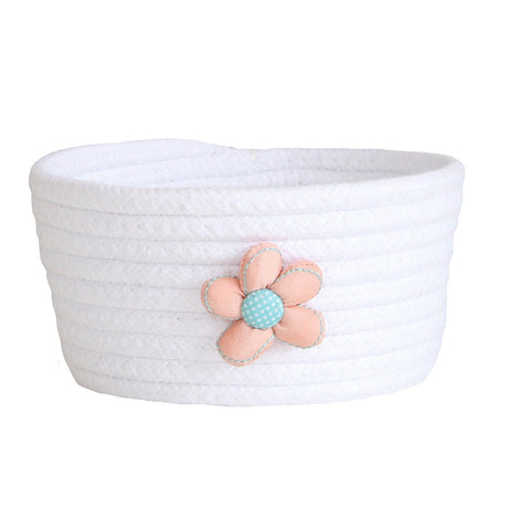 White woven cotton rope storage basket