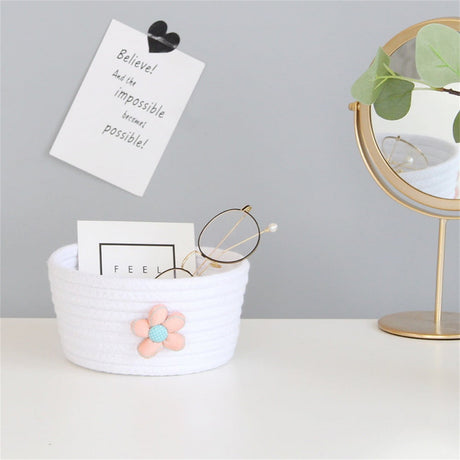 Small woven shelf toy basket in white