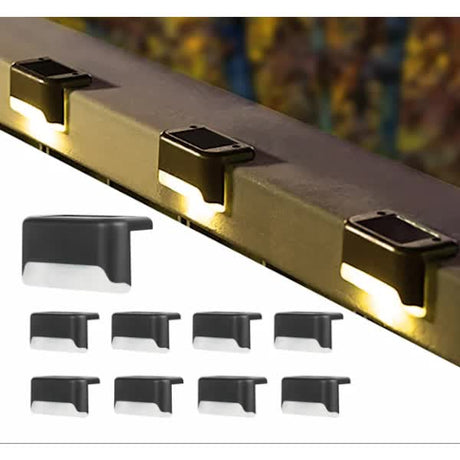 Solar LED outdoor lights in black with warm white glow - view 1