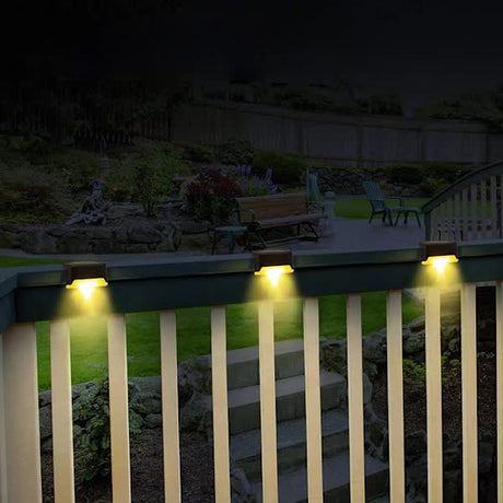 Solar LED outdoor lights in black with warm white glow - view 2