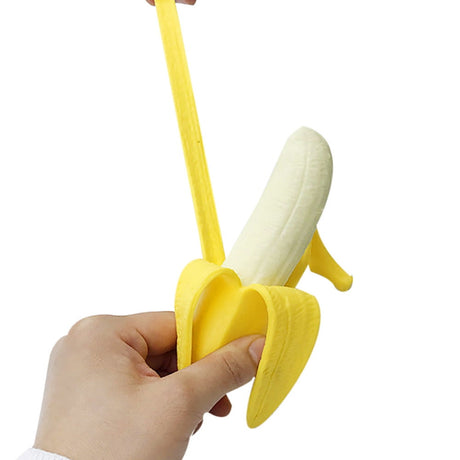 Stretchy banana stress ball being squeezed