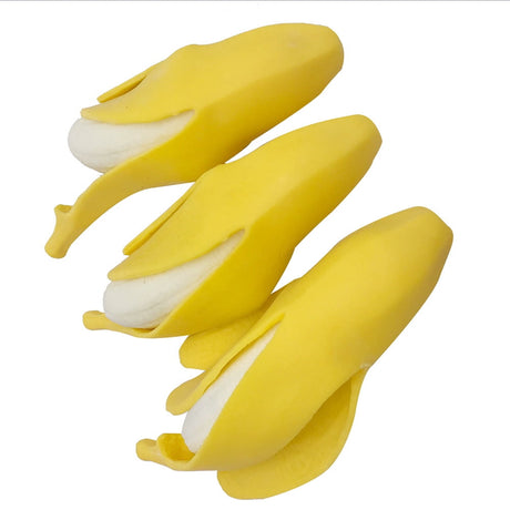 Soft banana squeeze toy held in hand