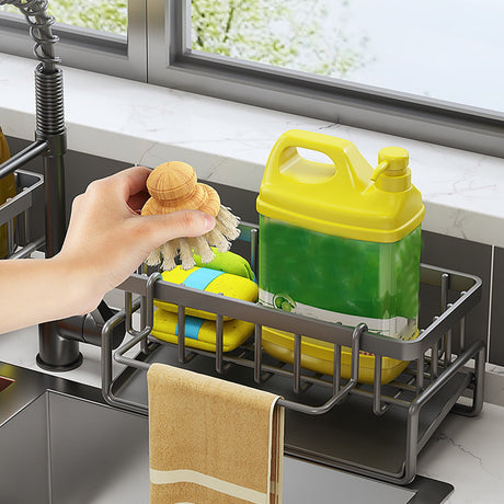 Hanging rod on the sink caddy with a dish cloth drying over it
