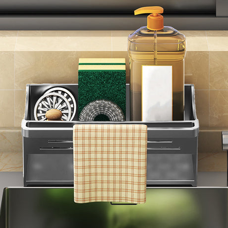 Sink sponge holder in use on a kitchen benchtop next to the tap