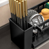 Sink sponge holder in use on a kitchen benchtop next to the tap