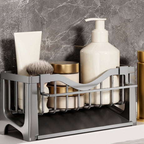 Sink sponge holder in use on a kitchen benchtop next to the tap